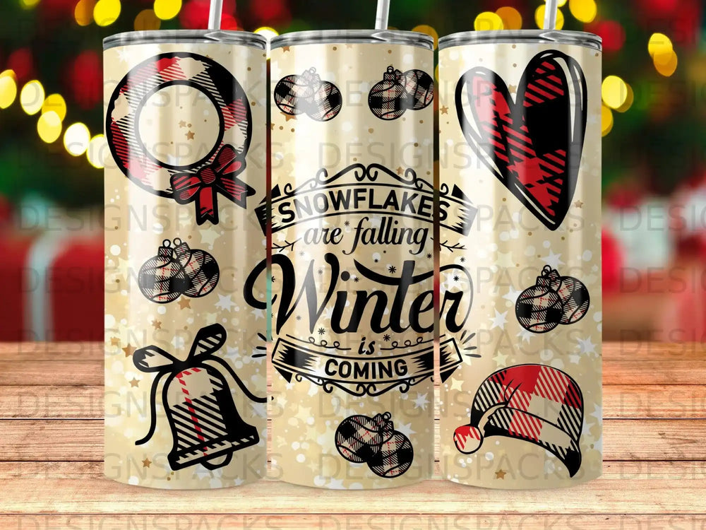 Tumbler with falling snowflakes, winter theme, and plaid accents.