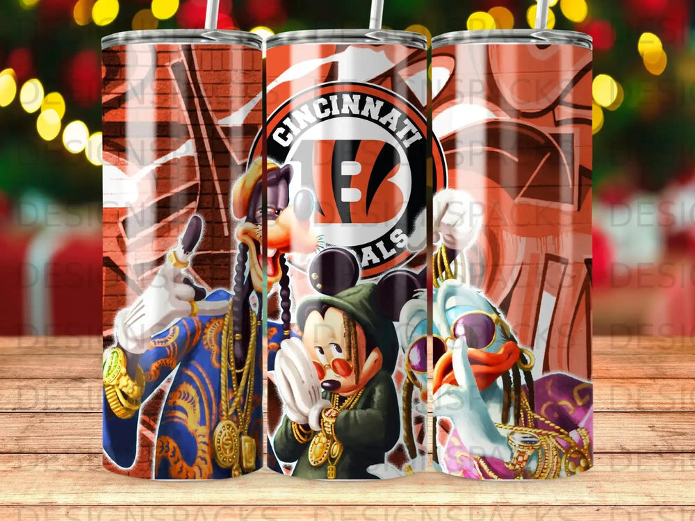 Trio of cartoon characters in Bengals-themed outfits with gold chains and jewelry.