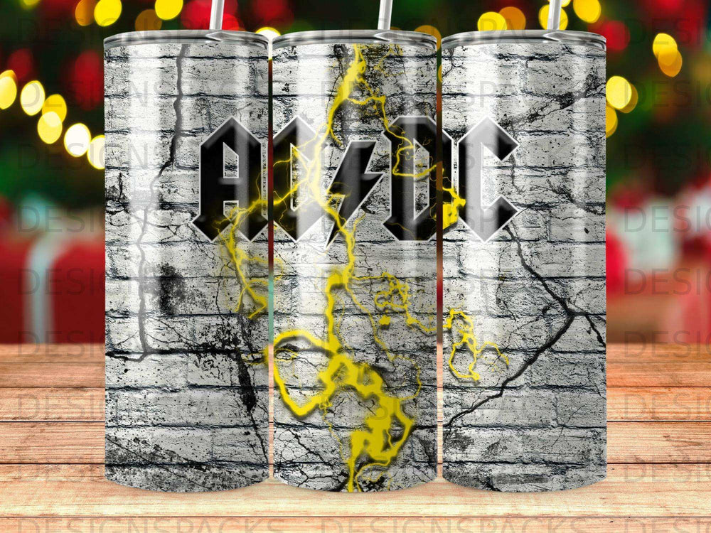 AC/DC logo on distressed brick with yellow lightning.
