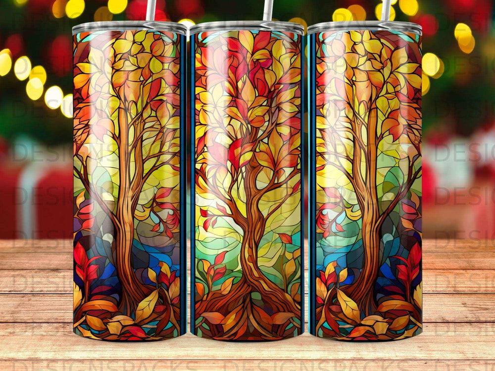 Stained glass tree with autumn leaves and colorful bokeh background.