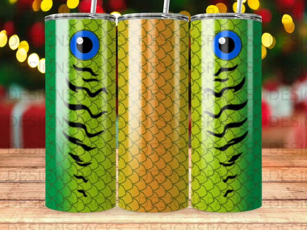 Green and orange fish scale pattern tumbler with blue eye.