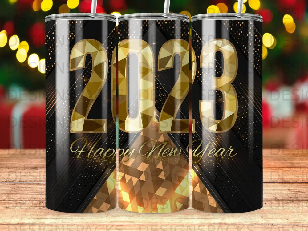 Gold 2023 Happy New Year tumbler with sparkling geometric pattern.