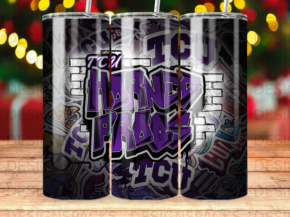 Purple and white TCU Horned Frogs graffiti tumbler with blurred lights background.