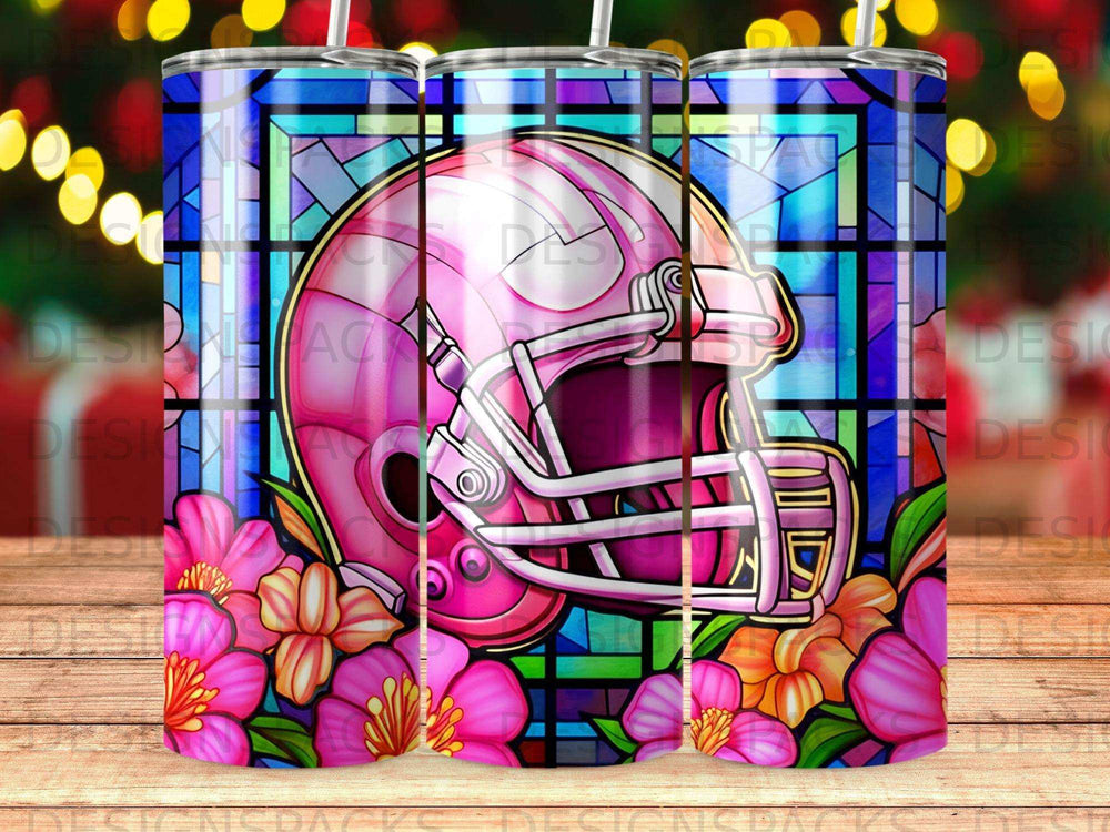 Pink football helmet with flowers against a stained glass background.