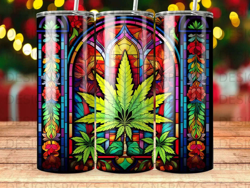 Stained glass tumbler featuring a cannabis leaf and floral motifs.
