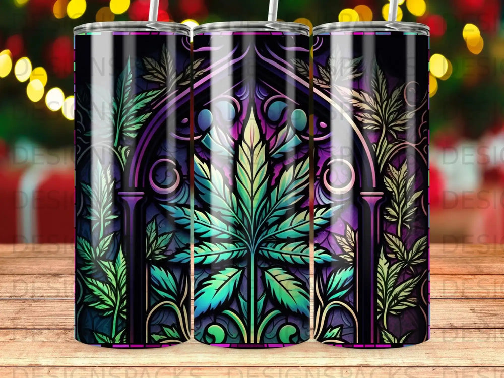 Tumbler with purple and green cannabis leaf pattern on dark background.