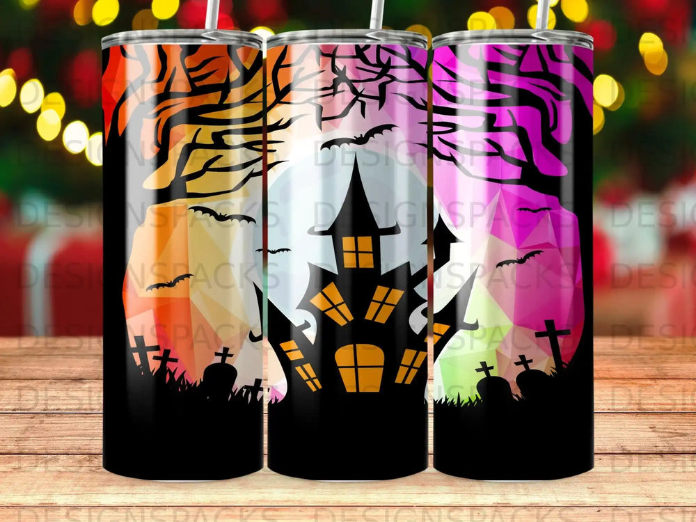 Halloween tumbler featuring a haunted house, bats, and cemeteries.