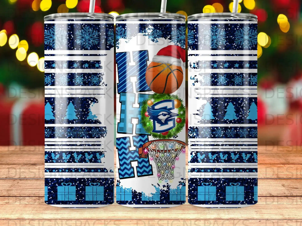 Tumbler with "HOME" text, basketball, and holiday pattern.