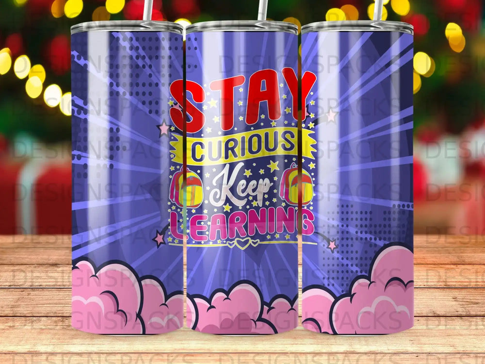 Blue tumbler with "Stay Curious Keep Learning" text and starry background.