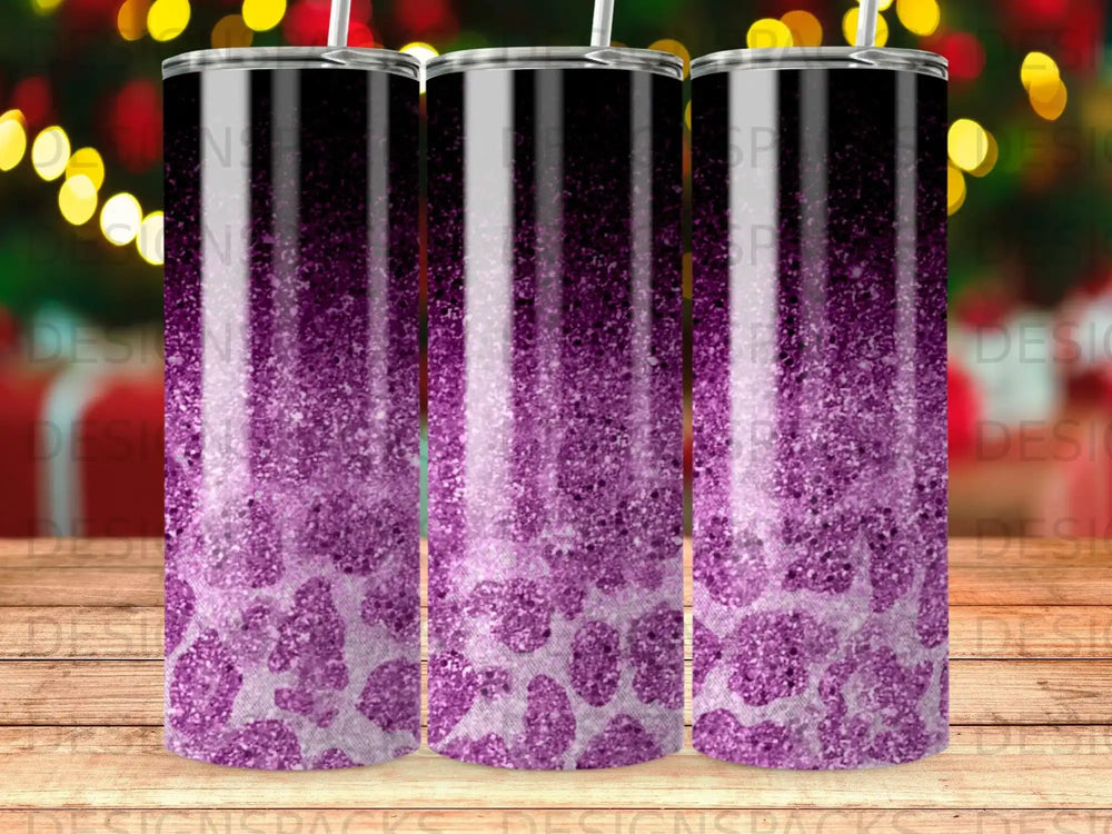 Tumbler cup with purple glitter and animal print design.