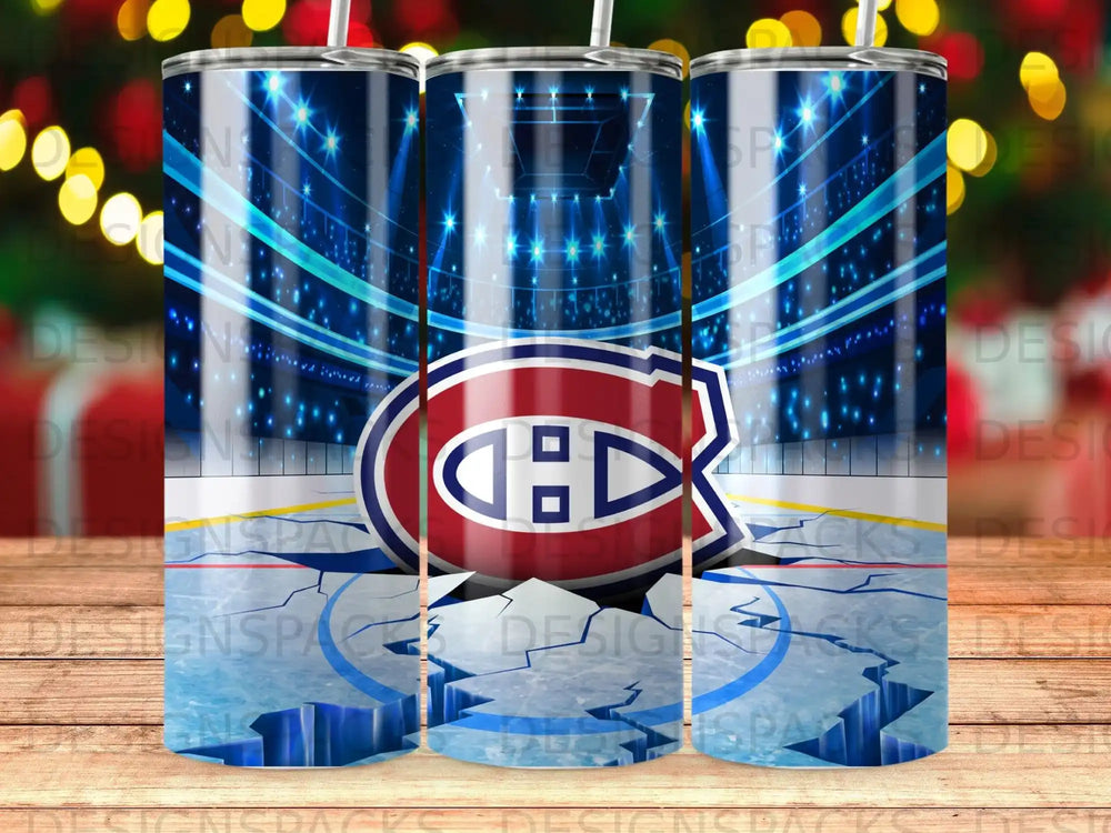 Montreal Canadiens logo on cracked ice in hockey arena.