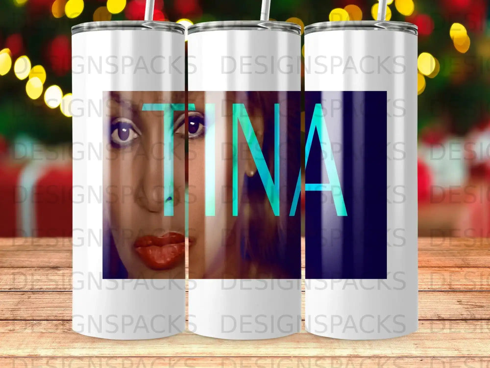 Tumbler with "TINA" text overlayed on a blurred background.