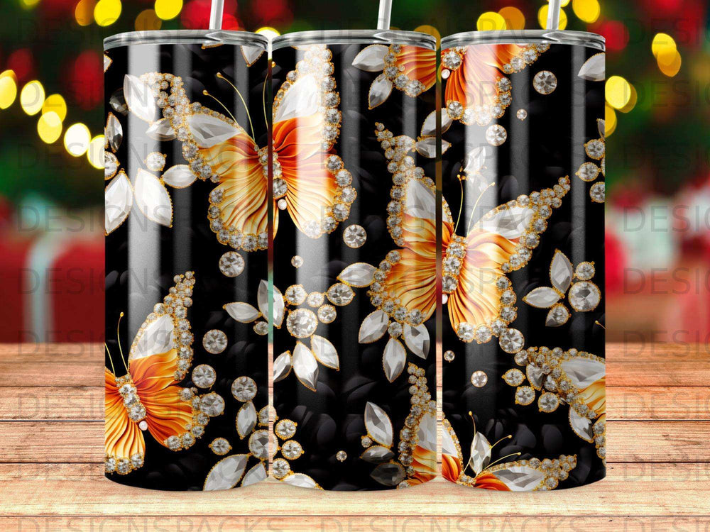 Black tumbler with repeating pattern of golden butterflies and diamonds.