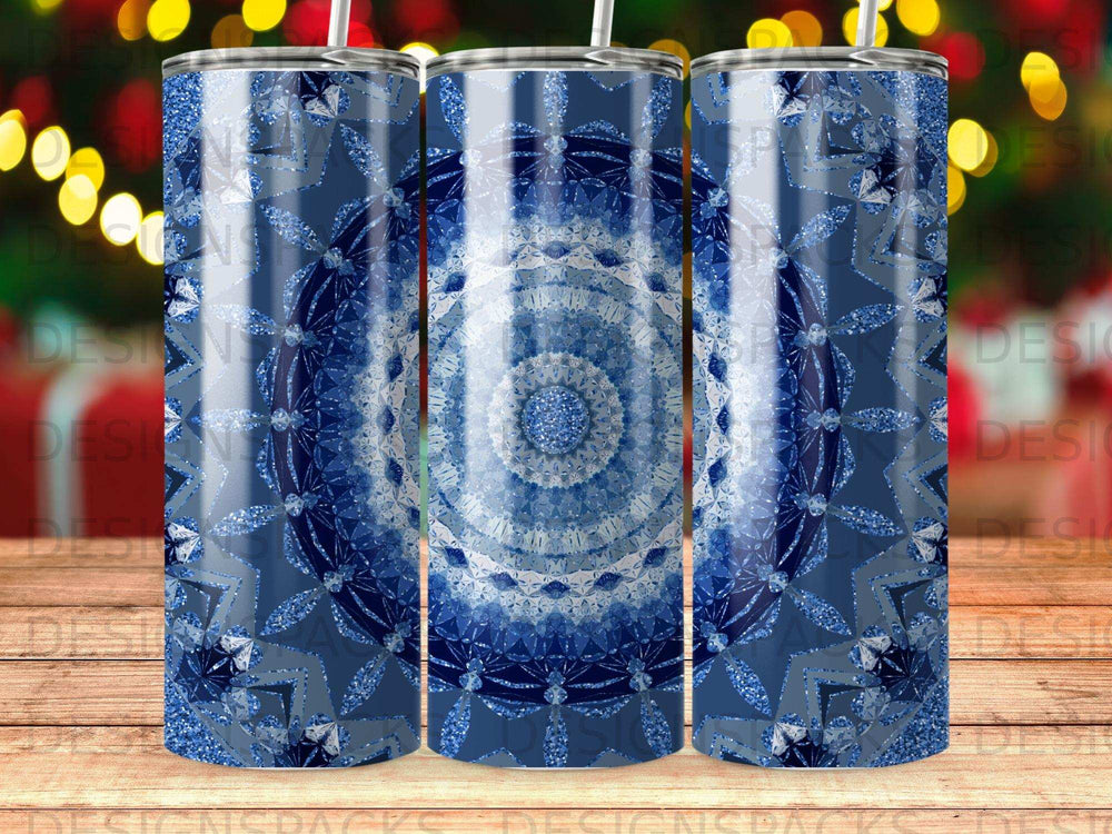 Blue glitter mandala pattern on a tumbler cup.