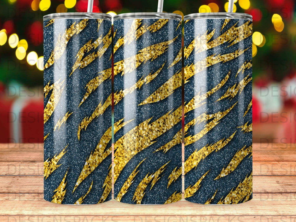 Dark blue tumbler with gold glitter tiger stripes.