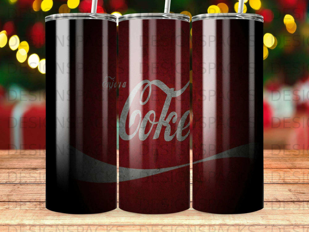 Coca-Cola tumbler with iconic logo and red, distressed background.