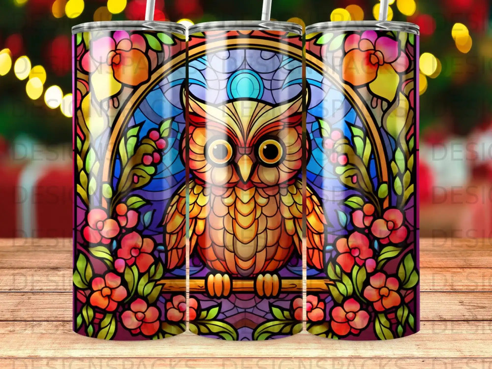 Stained glass owl with floral border on a tumbler wrap.