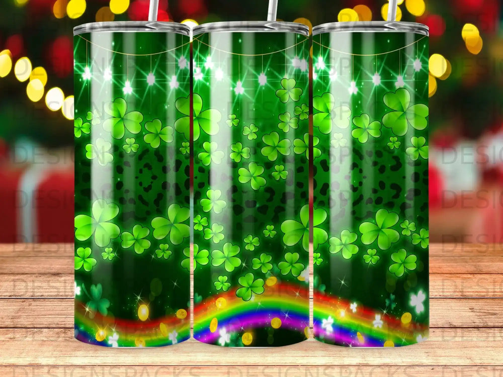 Green tumbler with shamrocks, rainbow, and festive lights.