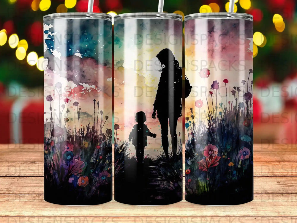 Silhouette of mother and child walking through a colorful floral field.