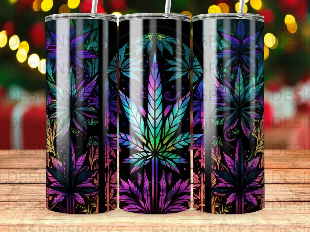 Three tumblers with a cannabis leaf design in vibrant purple and green.