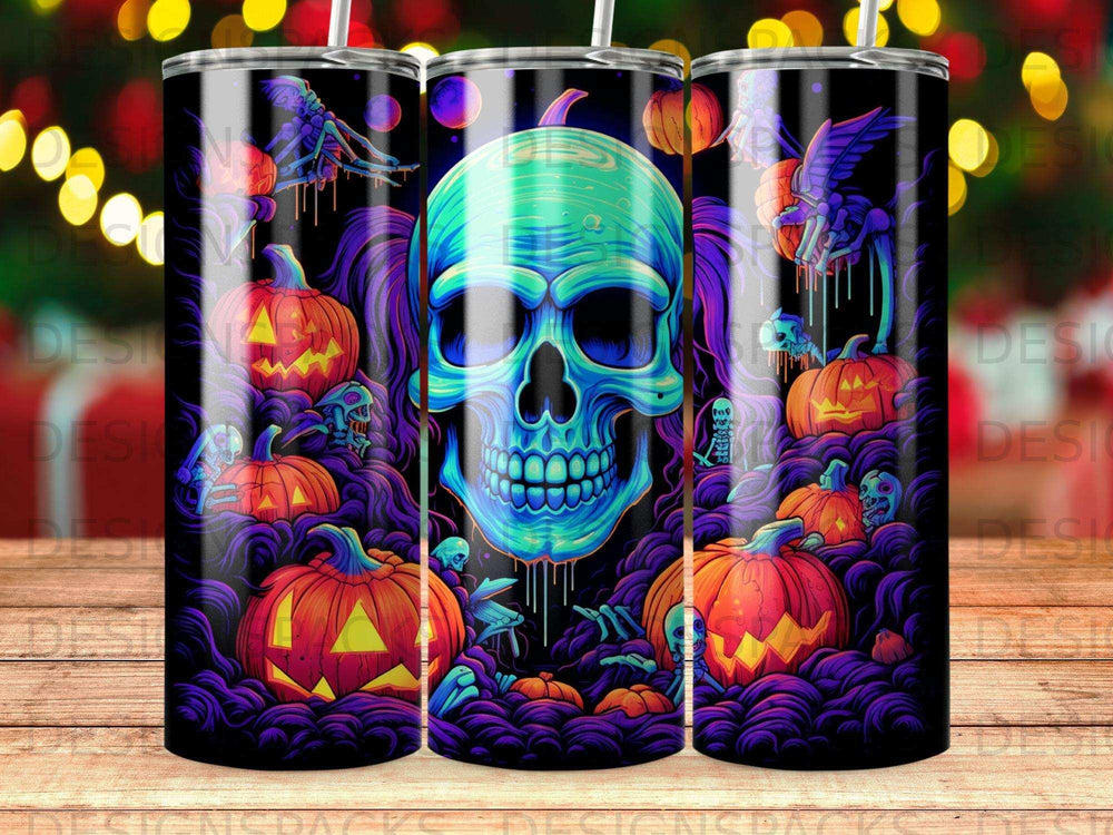 Halloween tumbler with a glowing skull, pumpkins, and skeletons.