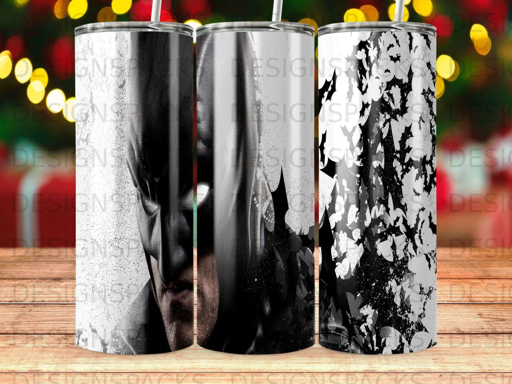 Batman mask and abstract white splash design on three tumblers.