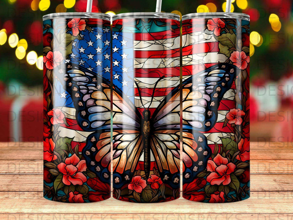 Butterfly with American flag and red flowers on a tumbler.