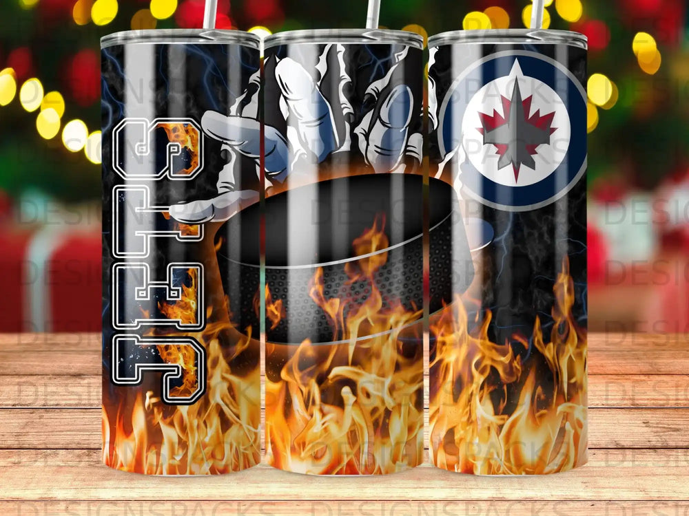 Winnipeg Jets hockey puck and flames tumbler with BTFG text.