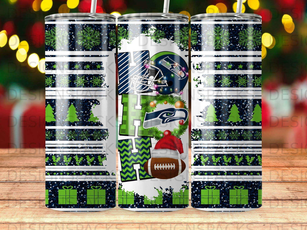 Seattle Seahawks "HO HO HO" holiday tumbler with snowflakes and gifts.