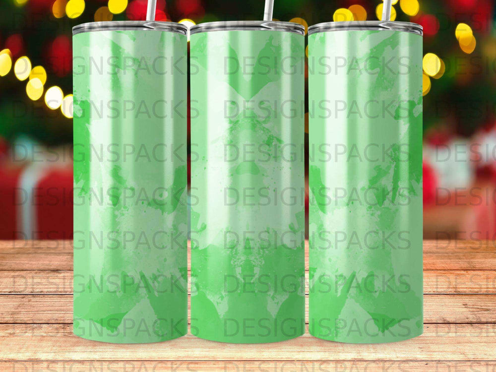Three green tumblers with the text "DESIGNSPACKS" repeated across them.
