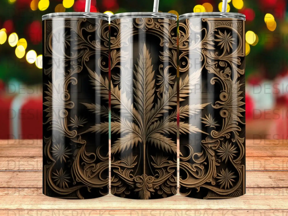 Gold cannabis leaf pattern on a tumbler with blurred bokeh background.
