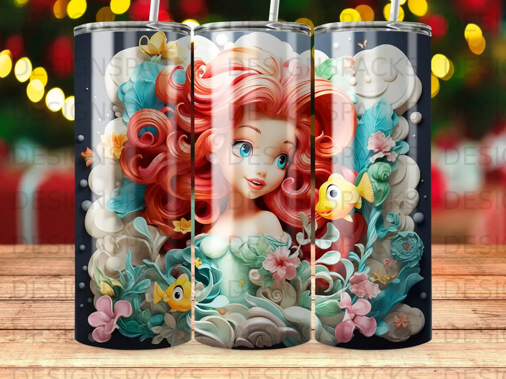 Ariel with fish and flowers, on a black patterned tumbler.