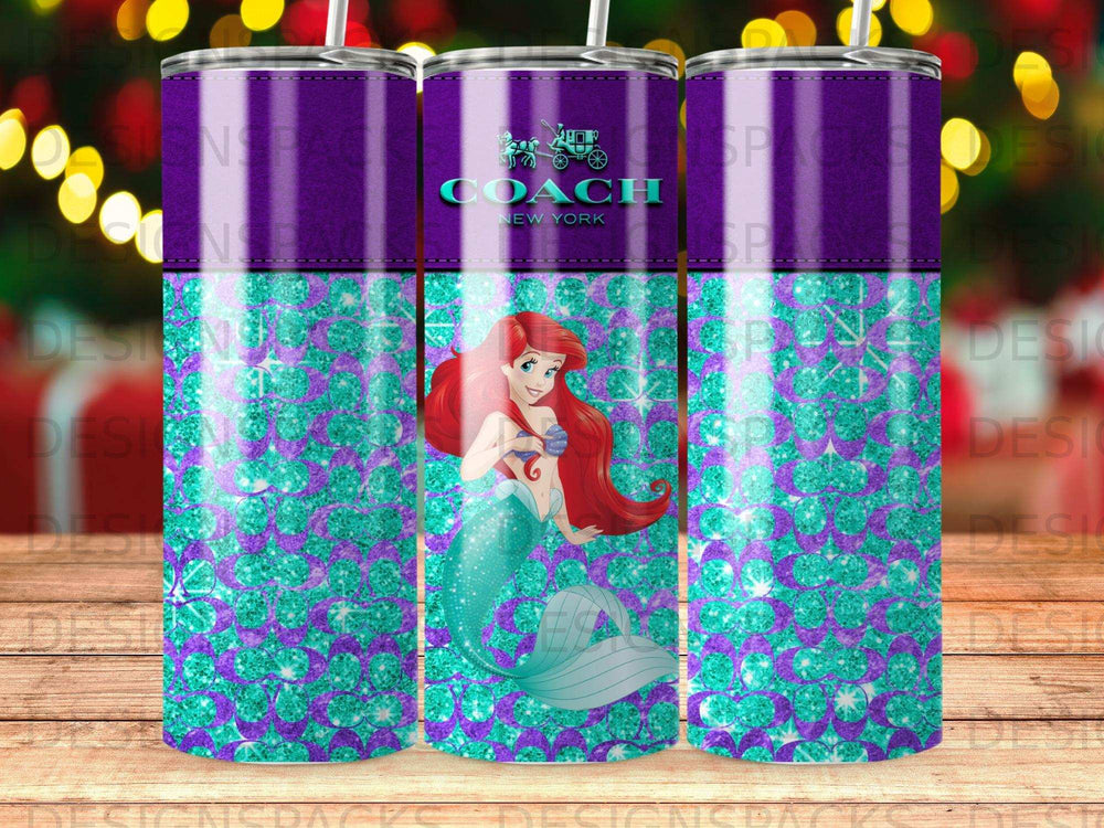 Coach New York mermaid tumbler with glitter and teal pattern.