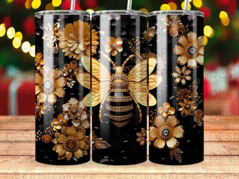 Golden bee and flowers on a black honeycomb pattern tumbler.
