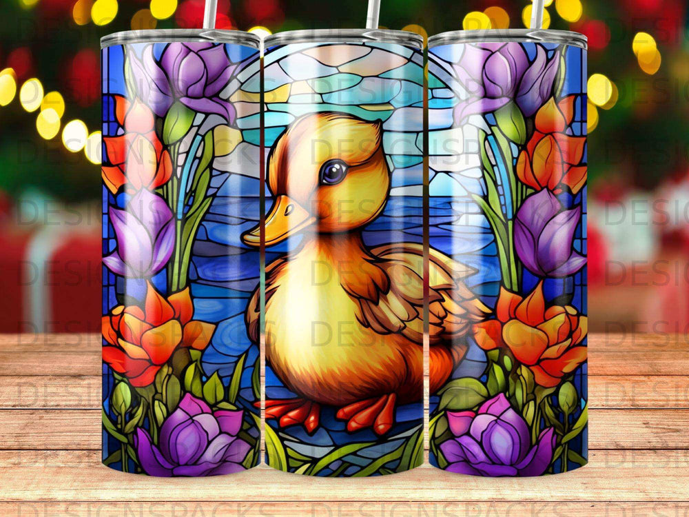 Stained glass-style tumbler featuring a duckling surrounded by colorful flowers.