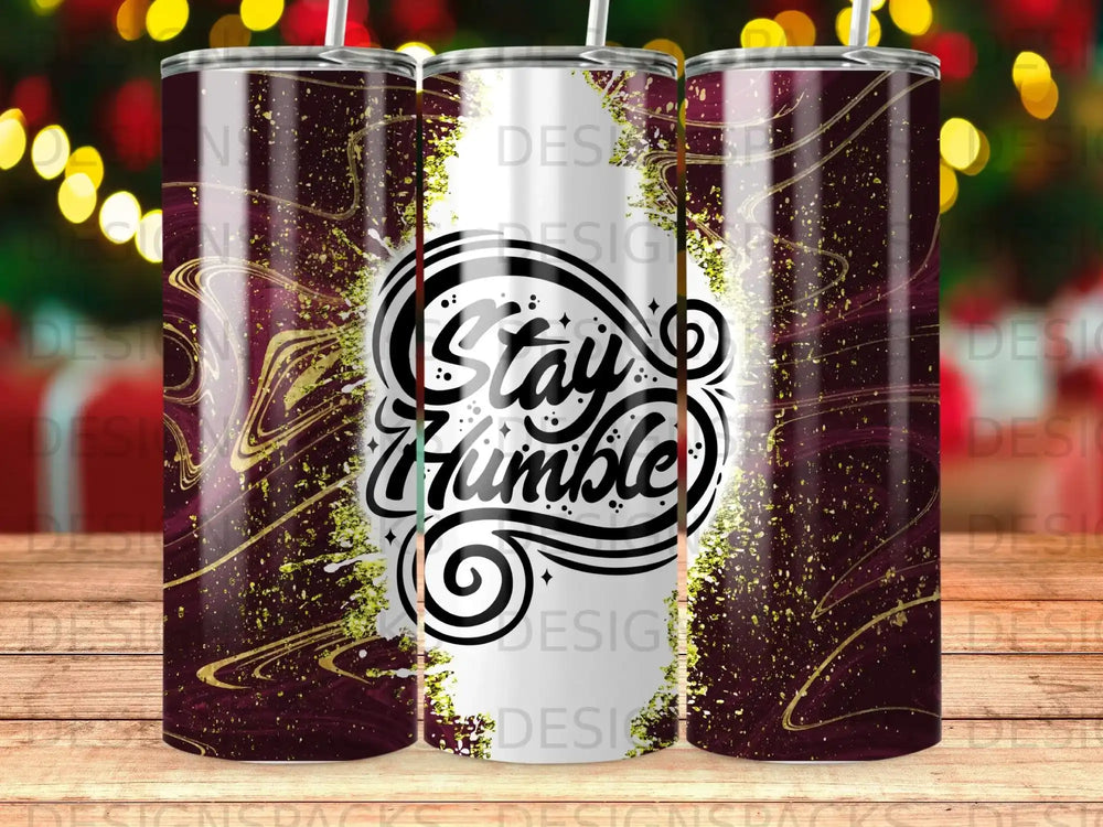Tumbler with "Stay Humble" text and gold glitter design.