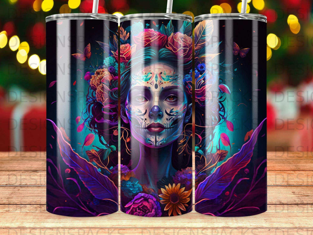 Woman's face painted with sugar skull design, surrounded by colorful flowers and leaves.
