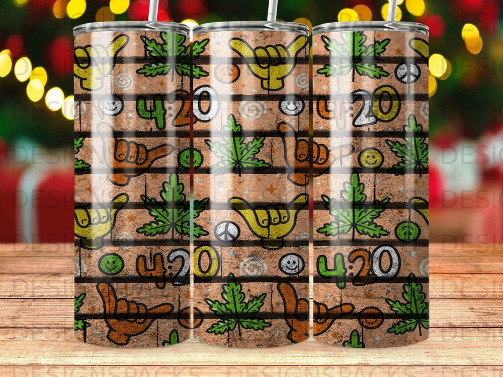 Tumbling tumblers with marijuana leaf and colorful smiley face designs.