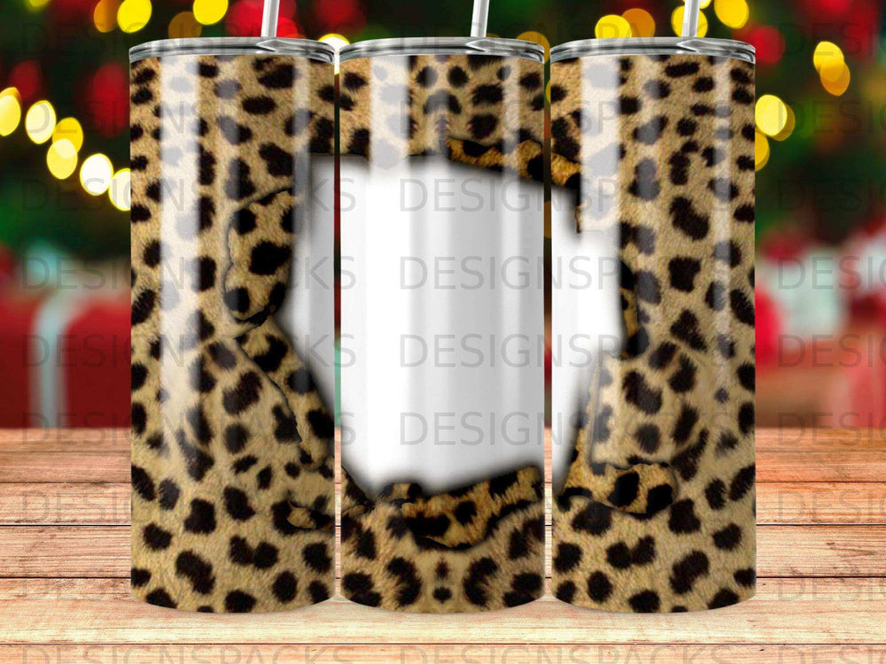 Leopard print tumbler with a blurred abstract design in the center.