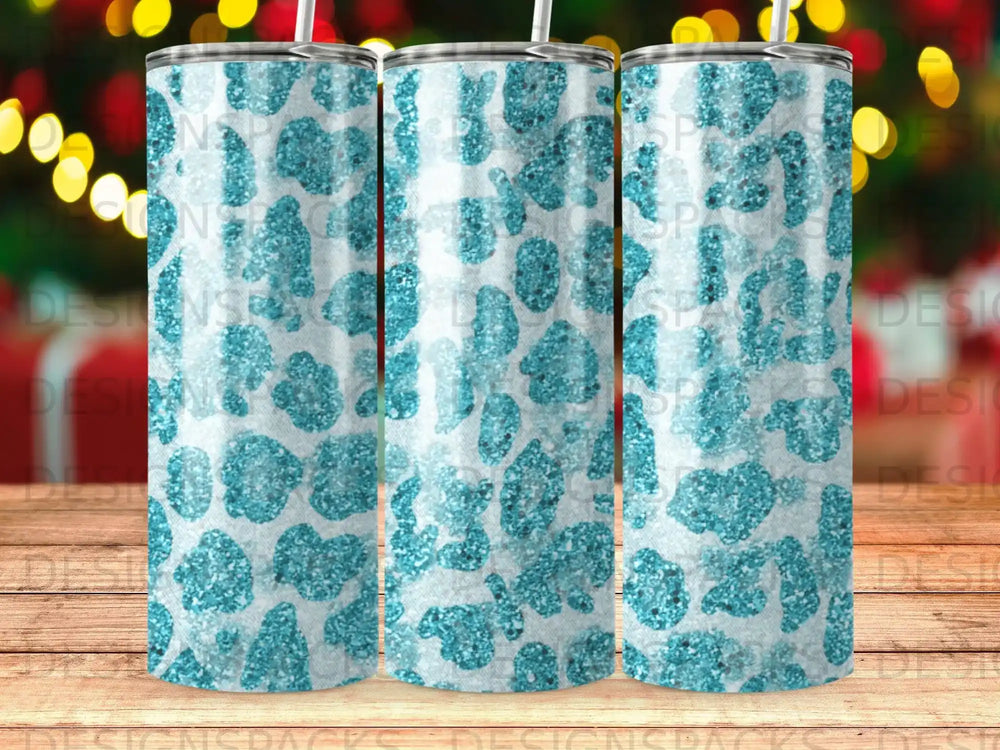 Blue leopard print glitter tumbler with straw.