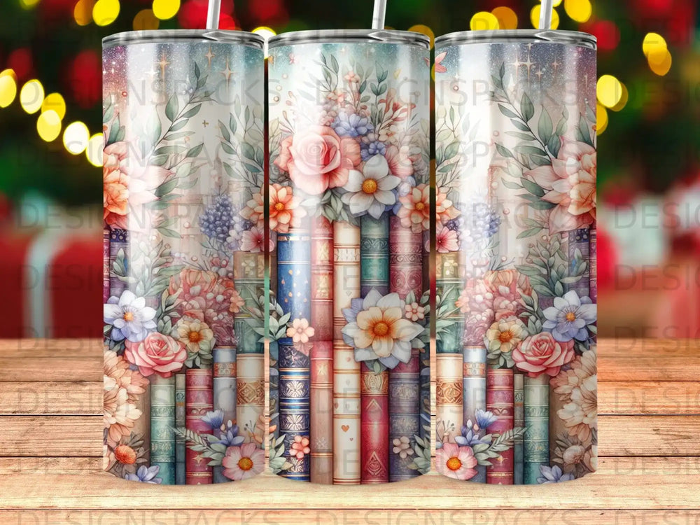 Three tumblers adorned with a vintage floral and book pattern.