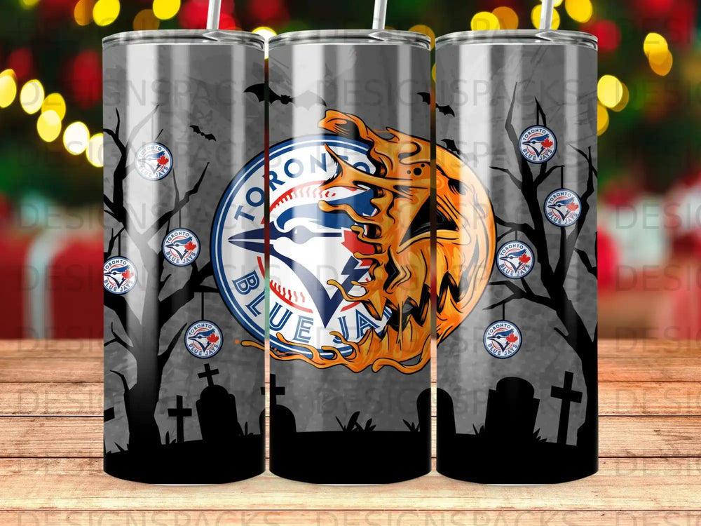 Toronto Blue Jays logo on a Halloween-themed tumbler with gravestones and trees.