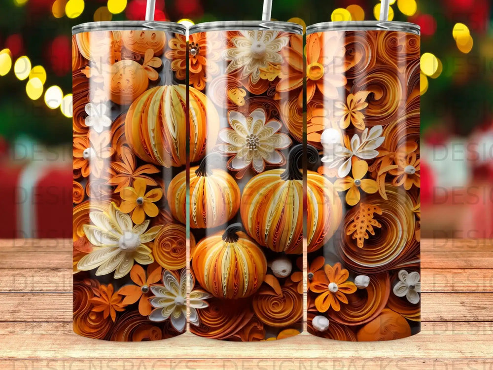 Autumn-themed tumbler with pumpkins, flowers, and swirling paper designs.
