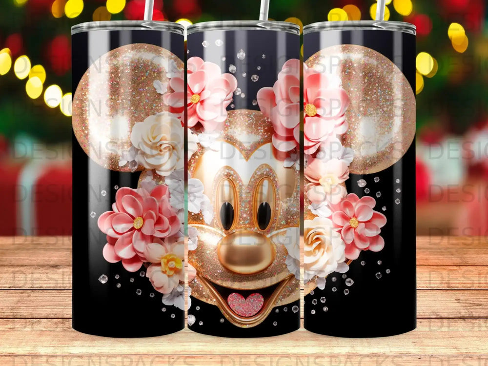 Mickey Mouse head with glitter and floral accents on a black tumbler.