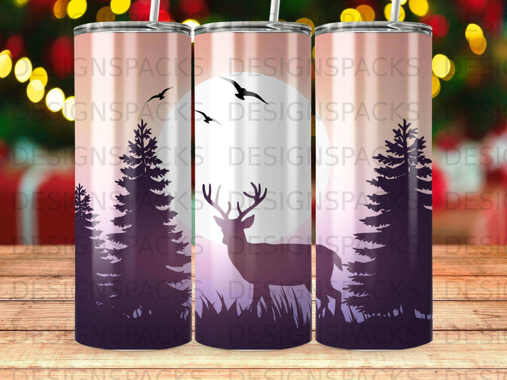 Three tumblers with a forest and deer silhouette against a sunset.