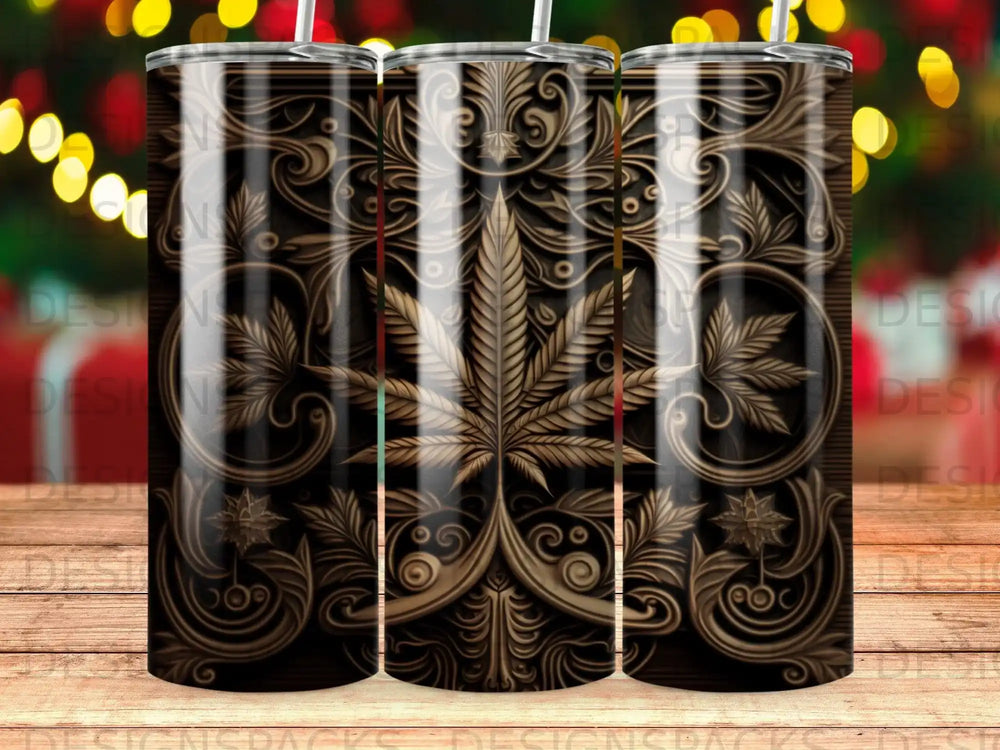 Tumbler with cannabis leaf and ornate scrollwork pattern.