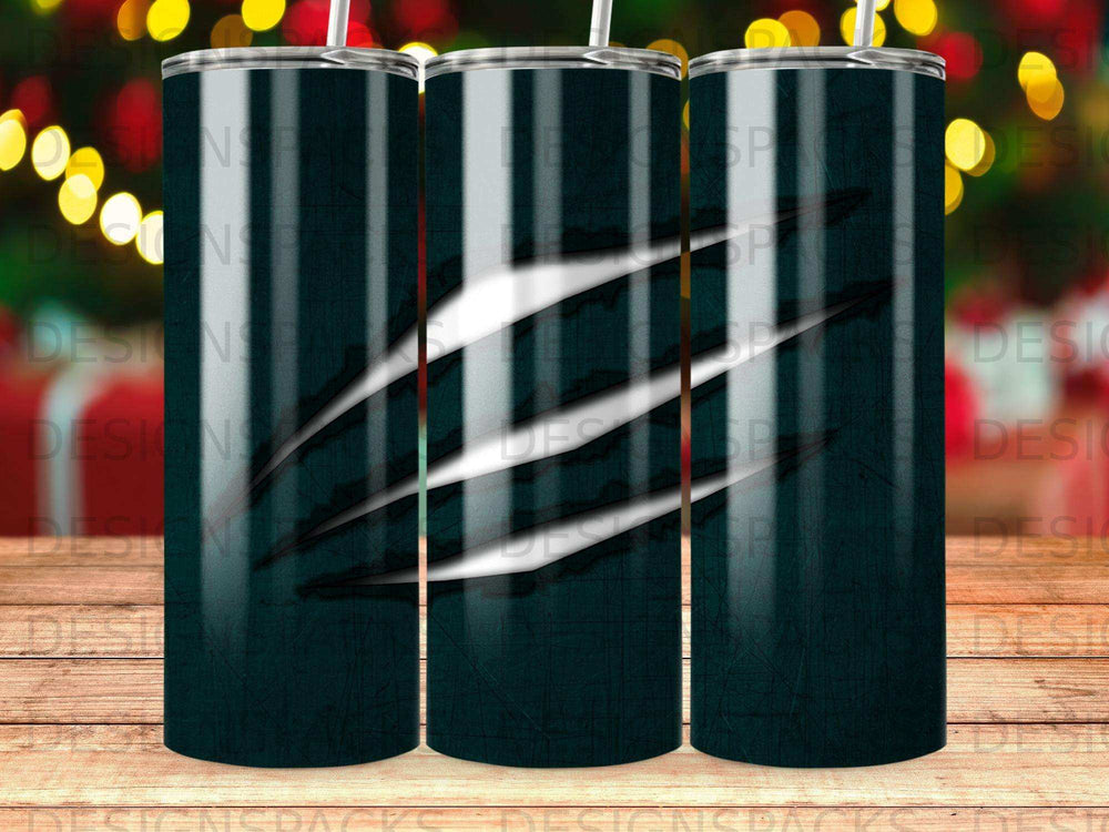 Dark green tumbler with glowing white claw marks.