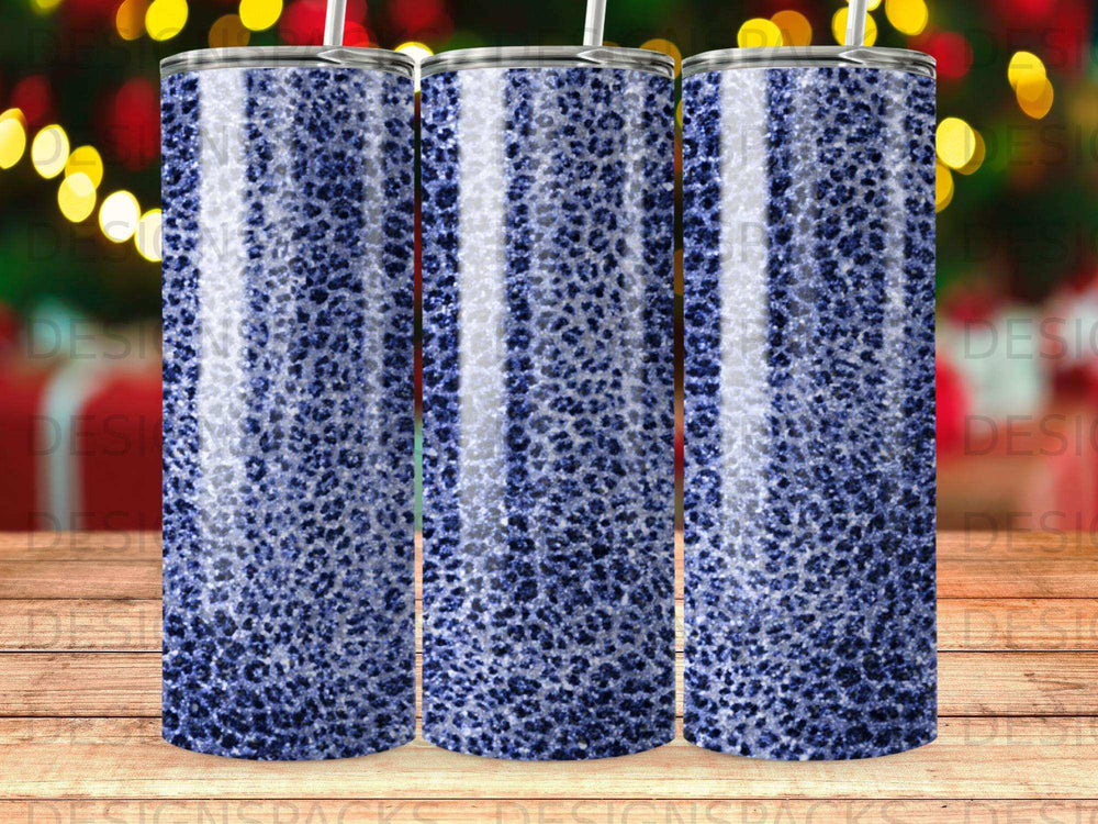 Three cylindrical tumblers with a dark blue leopard print pattern.