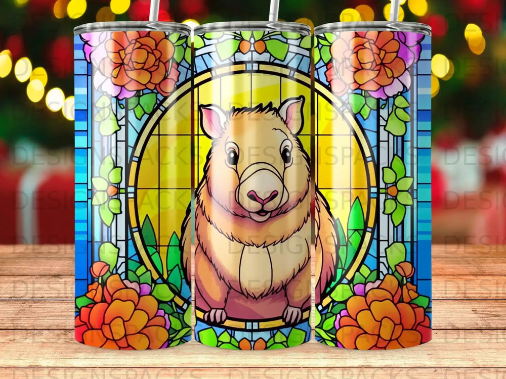 Stained glass window featuring a guinea pig surrounded by flowers and greenery.