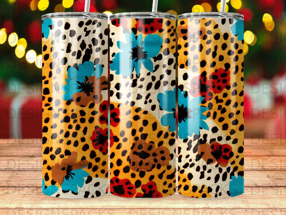 Leopard print tumbler with large blue and orange flowers.